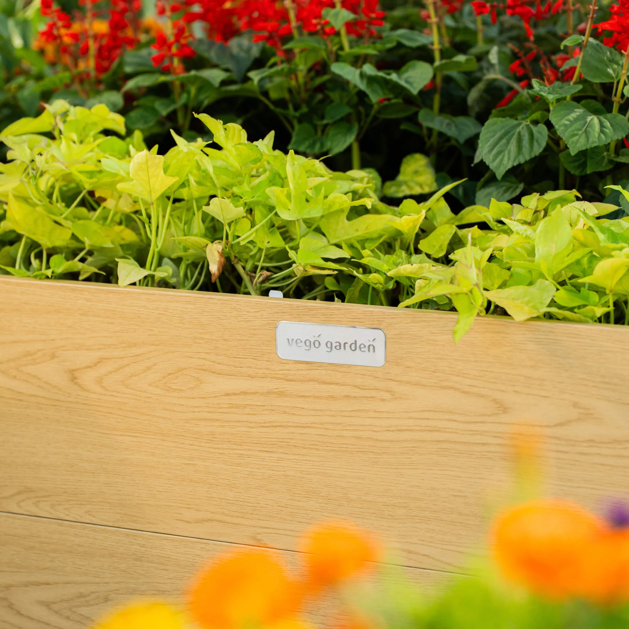 16" Tall Woodgrain 8' x 8' L-Shaped Metal Raised Garden Bed - Image 14
